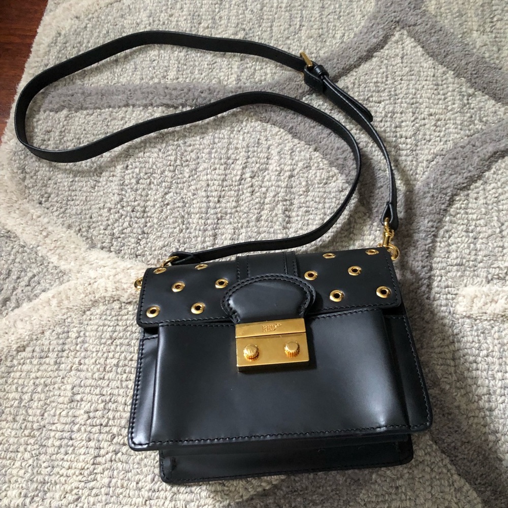 RED Valentino Black Leather Grommet Shoulder Bag